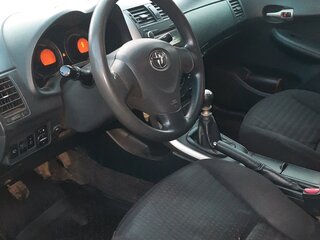 2010 Toyota Corolla X (E140, E150) Рестайлинг, чёрный, 500000 рублей, вид 3