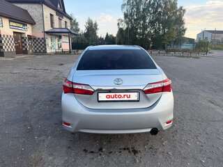 2013 Toyota Corolla XI (E160, E170, E180), серебристый, 920000 рублей, вид 3