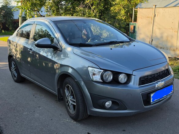 2015 Chevrolet Aveo II, серый - вид 1