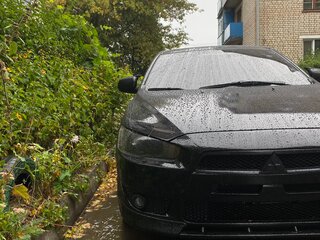 2007 Mitsubishi Lancer X, чёрный, 750000 рублей, вид 1