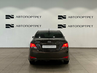 2016 Hyundai Solaris I Рестайлинг, коричневый, 509000 рублей, вид 4