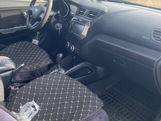 2013 Kia Rio 4-speed III, чёрный, 730000 рублей, вид 5
