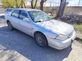 1999 Kia Clarus II, серебристый, 220000 рублей - вид 3