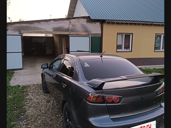 2010 Mitsubishi Lancer X, серый, 700000 рублей - вид 3
