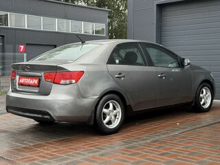 2010 Kia Cerato 5-speed II, серый, 289000 рублей, вид 4