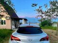 2011 Opel Astra GTC J Рестайлинг, белый, 780000 рублей - вид 5
