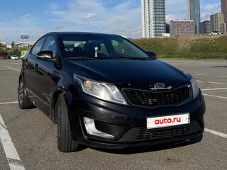 2011 Kia Rio 4-speed III, чёрный, 690000 рублей, вид 1