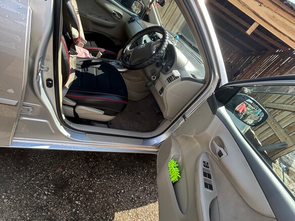 2010 Toyota Corolla Axio X (E140, E150) Рестайлинг, серебристый, 1200000 рублей - вид 8