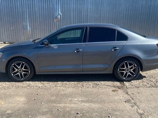 2017 Volkswagen Jetta VI Рестайлинг, серебристый, 1350000 рублей, вид 4