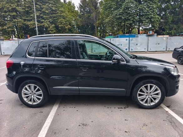 2014 Volkswagen Tiguan I Рестайлинг, чёрный - вид 1