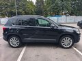 2014 Volkswagen Tiguan I Рестайлинг, чёрный - вид 1