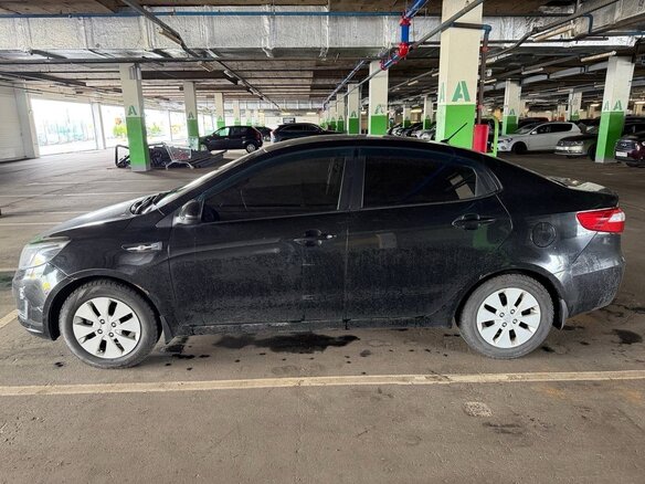 2012 Kia Rio III, чёрный - вид 4