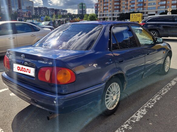 1999 Toyota Corolla VIII (E110), синий - вид 4