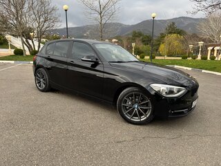2014 BMW 1 серии 116i II (F20/F21), чёрный, 1350000 рублей, вид 1