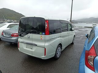 2017 Honda Stepwgn V Рестайлинг, серый, 1850000 рублей, вид 4