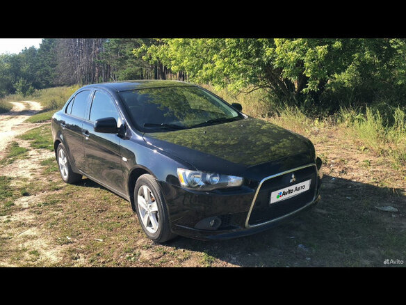 2008 Mitsubishi Lancer X, чёрный, 650000 рублей - вид 13