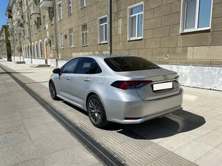2022 Toyota Corolla XII (E210), серебристый, 1660000 рублей, вид 2