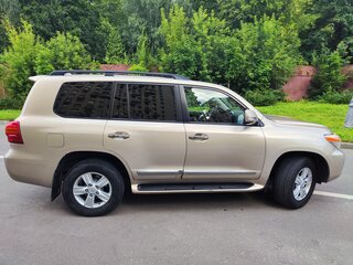 2013 Toyota Land Cruiser 200 Series Рестайлинг 1, золотистый, 3900000 рублей, вид 4