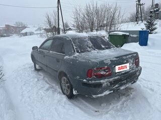 2003 Mitsubishi Carisma I Рестайлинг, зелёный, 210000 рублей, вид 4