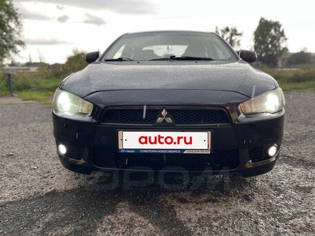 2010 Mitsubishi Lancer X, чёрный, 630000 рублей, вид 1