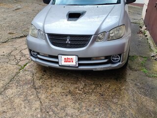 2003 Mitsubishi Airtrek I Рестайлинг, серебристый, 800000 рублей, вид 2