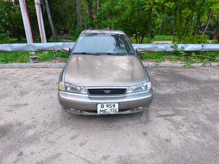 2001 Daewoo Nexia I, золотистый, 70000 рублей, вид 1