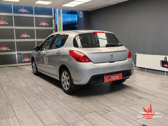 2011 Peugeot 308 I Рестайлинг, серебристый - вид 1
