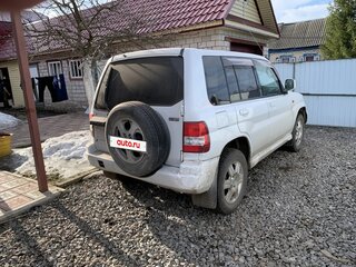 1999 Mitsubishi Pajero iO, белый, 550000 рублей, вид 2