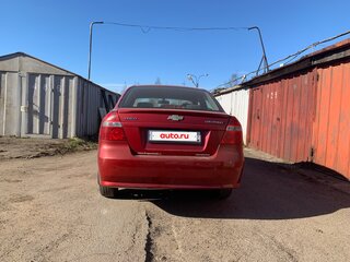 2011 Chevrolet Aveo I Рестайлинг, красный, 280000 рублей, вид 4