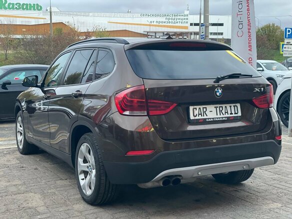 2014 BMW X1 20i I (E84) Рестайлинг, коричневый, 1400000 рублей - вид 6