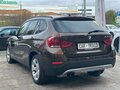 2014 BMW X1 20i I (E84) Рестайлинг, коричневый, 1400000 рублей - вид 6