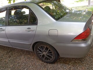 2005 Mitsubishi Lancer IX, серебристый, 550000 рублей, вид 4