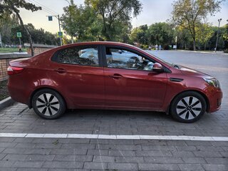 2012 Kia Rio 4-speed III, красный, 850000 рублей, вид 4