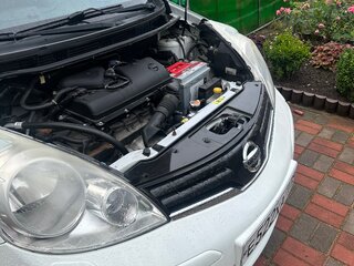 2011 Nissan Note I Рестайлинг, белый, 670000 рублей, вид 3
