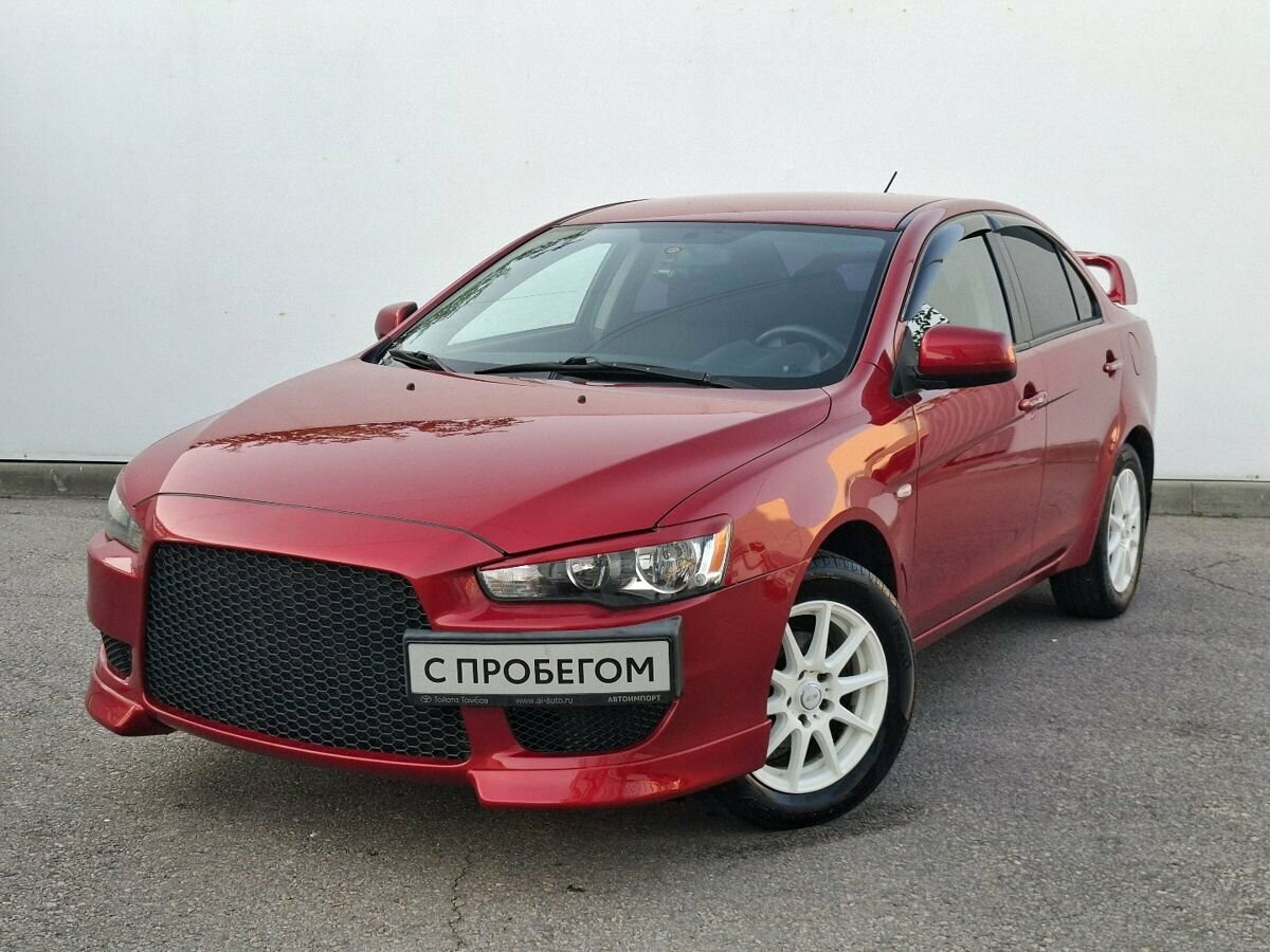Открыть фотографии: Mitsubishi Lancer X