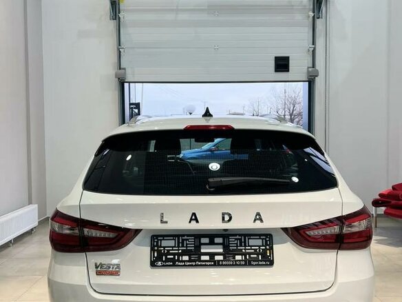 2026 Lada (ВАЗ) Vesta SW Cross I Рестайлинг (NG), белый - вид 2