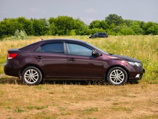 2011 Kia Cerato 6-speed II, пурпурный, 755000 рублей, вид 5