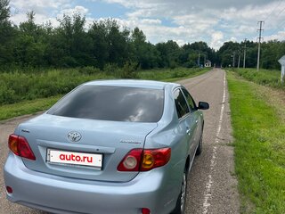 2007 Toyota Corolla X (E140, E150), голубой, 750000 рублей, вид 4