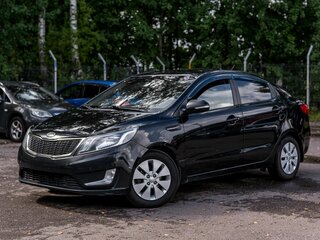 2012 Kia Rio 5-speed III, чёрный, 660000 рублей, вид 1
