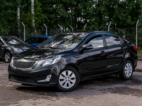 2012 Kia Rio 5-speed III, чёрный, 670000 рублей, вид 1