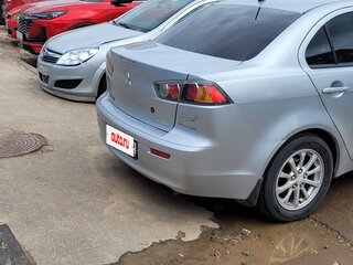 2010 Mitsubishi Lancer X, серый, 599000 рублей, вид 4