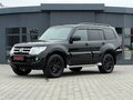 2014 Mitsubishi Pajero IV Рестайлинг 1, чёрный - вид 2