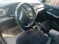 2015 Kia Rio III Рестайлинг, чёрный, 740000 рублей - вид 3