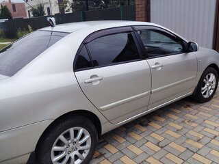 2006 Toyota Corolla IX (E120, E130) Рестайлинг, серебристый, 700000 рублей, вид 4