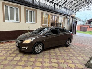 2014 Hyundai Solaris I Рестайлинг, коричневый, 870000 рублей, вид 1