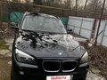 2012 BMW X1 18i I (E84), чёрный, 1020000 рублей