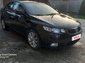 2011 Kia Cerato II, чёрный - вид 1