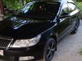 2011 Skoda Octavia II (A5) Рестайлинг, чёрный, 810000 рублей - вид 1