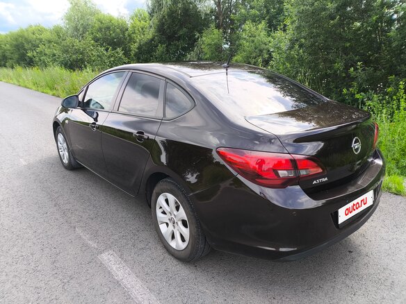 2014 Opel Astra J Рестайлинг, коричневый, 750000 рублей - вид 5