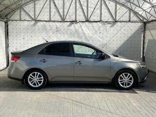 2012 Kia Cerato 6-speed II, серебристый, 820000 рублей, вид 4